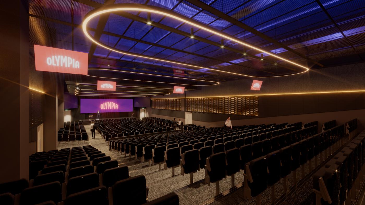 An image showing 'The ICC at Olympia auditorium with tiered seating and stage'