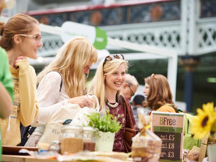 Visitors laughing together at an event