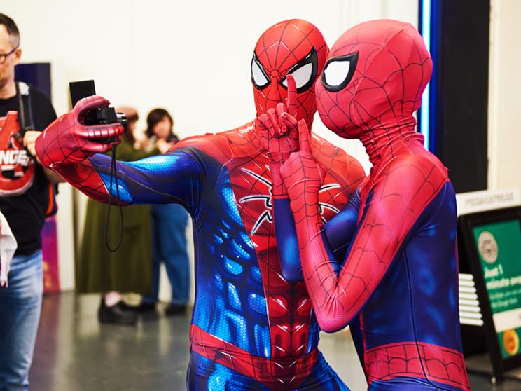 Two people dressed as Spiderman.