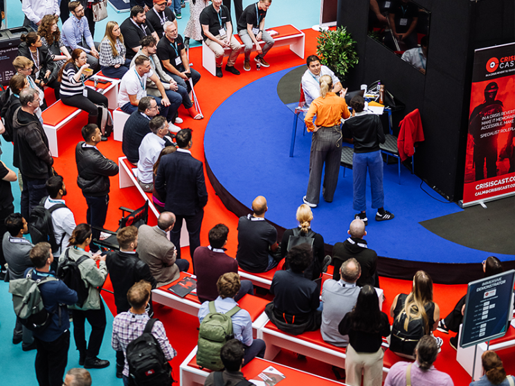 Large crowd gathering stage at International Cyber Expo