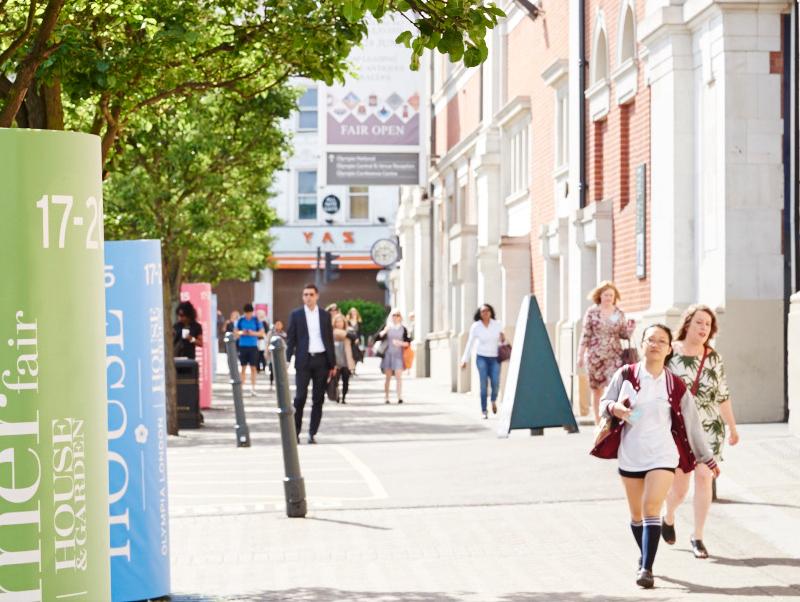 Visitors arriving at Olympia London