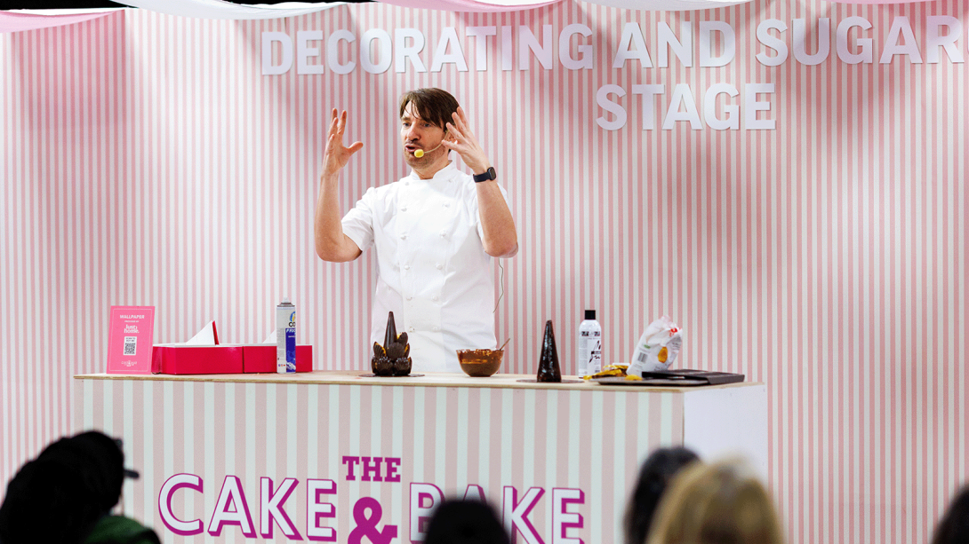 A chef delivering a baking masterclass.