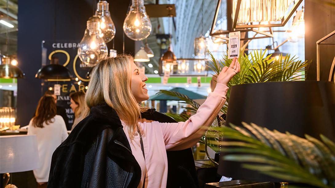 Woman looking at light display.