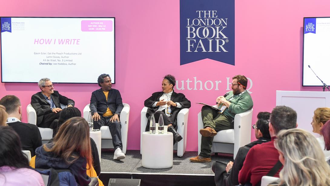 A bustling scene at the London Book Fair, showcasing diverse publishers and enthusiastic attendees exploring literature.