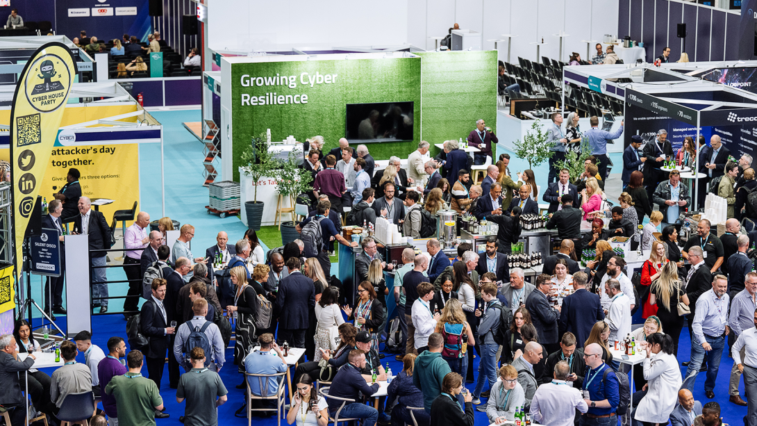 Busy crowds gathering on the show floor at International Cyber Expo