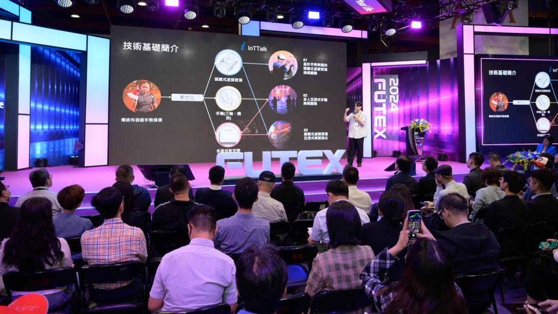 A crowd of people around a stage 